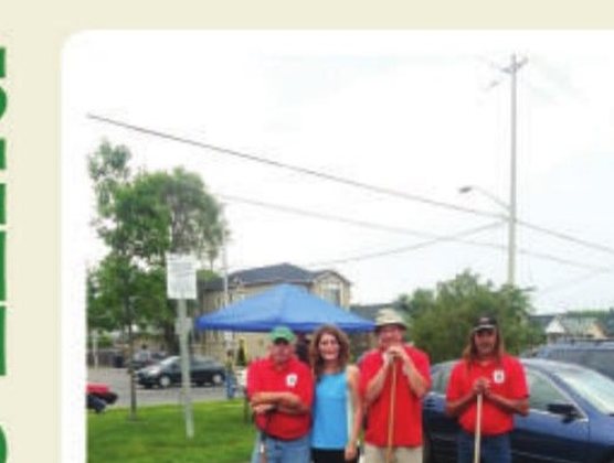 Local 416 members handing out free compost to residents at a June Environment Day